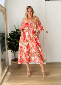 Detailansicht des Blumenkleides mit eckigem Ausschnitt, Puffärmeln und elastischer Taille