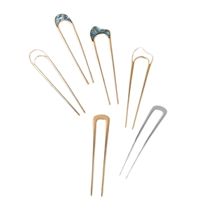 Minimalist U-shaped hair forks in gold and silver metal with elegant shell inlay