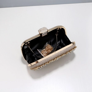 Champagne gold evening clutch with rhinestones, metal frame and chain strap