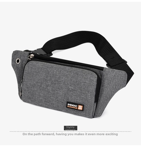 Detail of grey oxford fabric texture and headphone jack on sport waist bag