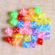 Macro shot of 16mm colorful transparent dice beads for DIY handmade jewelry crafting