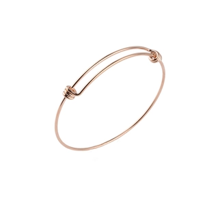 Detail of a minimalist rose gold adjustable wire bracelet with sliding closure knot