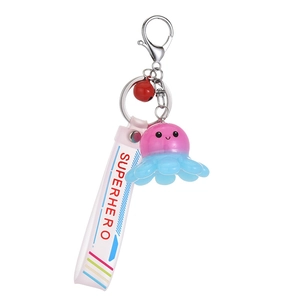 Pink and blue gradient octopus keychain with LED light and Superhero silicone wrist strap
