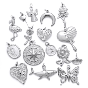 Set of 15 silver stainless steel charms with heart butterfly and ocean motifs