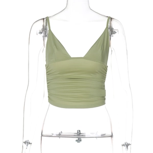 Detail shot of the V-neck pleated texture on a green slim-fit crop top vest camisole