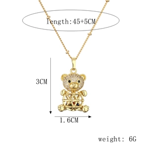 Golden bear pendant with white zircon details and dimension measurements 45+5cm length