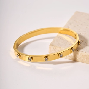 18k gold plated stainless steel hinge bangle with sparkling crystal stone inlay