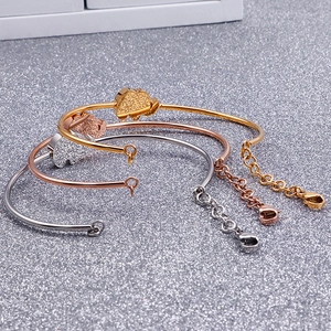 Adjustable elephant stainless steel open bracelets in gold, rose gold, and silver finishes