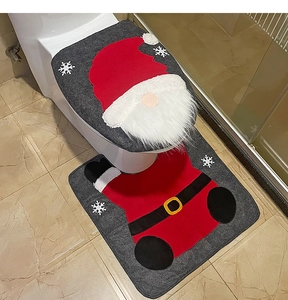 Detail of Christmas gnome toilet seat cover and rug set with soft faux fur texture