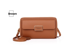 Close-up of brown textured leather phone bag with magnetic flap and metal hardware logo