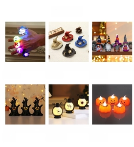 Close-up of Halloween LED decorations featuring pumpkin candle lights and glowing party favors