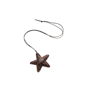 Retro leopard print star pendant necklace with brown leather texture and stitching detail