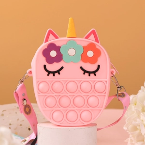 Pink unicorn pop-it fidget purse with colorful floral detail and doughnut print strap
