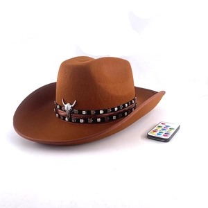 Detail of brown LED cowboy hat with RF remote and metallic bull head buckle decoration