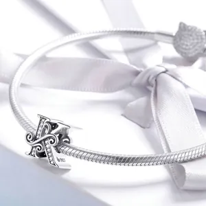 Sterling silver letter K charm bead with pavé zircon stones on a snake chain bracelet