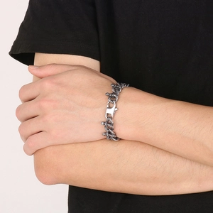 Detail of vintage snake-shaped stainless steel bracelet with lobster clasp for men