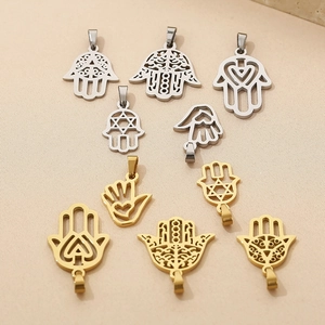 Hamsa Hand pendants in gold and silver stainless steel with hollow star and heart patterns