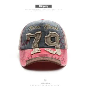 Front view of vintage washed baseball cap with 79 patchwork and New York embroidery