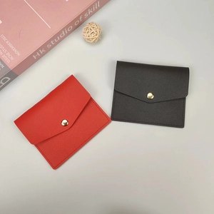 Slim lychee leather card holder for women with gold snap button in red and black