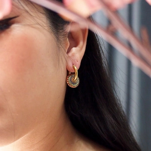 Retro 18k gold plated stainless steel daisy enamel drop earrings worn by a model