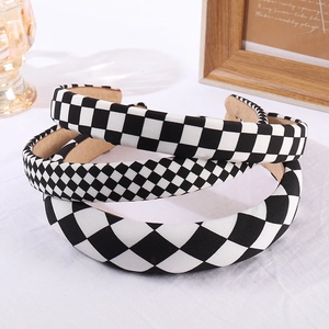 Chic black and white checkerboard headbands with soft sponge padding for women