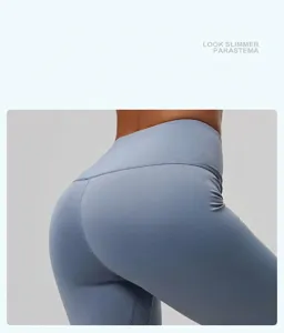 Detail of high waist light blue yoga shorts showing V-shaped back seam for peach lift effect