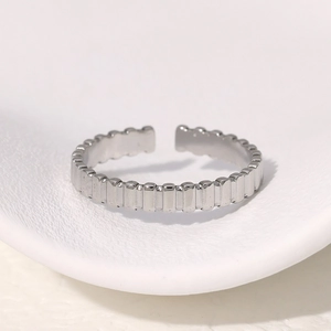 Minimalist adjustable stainless steel ring with vertical striped texture in silver finish