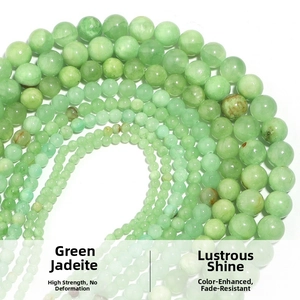 Detailed view of polished green aventurine beads in various sizes for DIY jewelry making