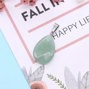 Waterdrop shaped watermelon crystal stone pendant with silver bail on decorative card