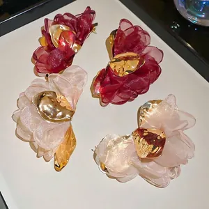 Elegant chiffon floral earrings with metallic center petals in wine red and cream white
