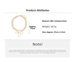 Detailed view of layered faux pearl and gold bead necklace with beaded bow pendant charm