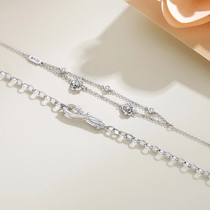 Bracciale a doppio strato in argento 925 con pendente rosa a spine e cristallo lucido