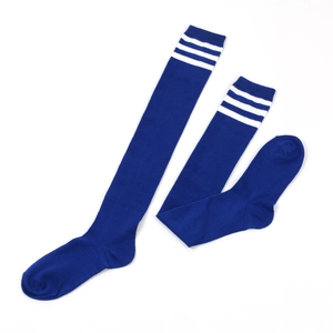 Detail of dark blue over-the-knee socks featuring three white stripes in a flat lay view