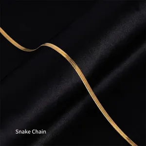 Elegant 18K gold-plated titanium steel blade chain necklace on black silk backdrop