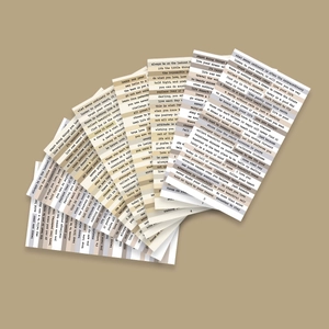 Close-up of DIY Small Talk vintage stickers with motivational English quotes for scrapbooking
