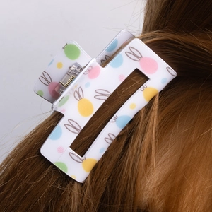 Easter bunny egg hair claw clip for women featuring colorful polka dots on white acrylic