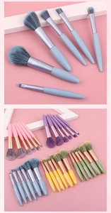 Detail view of colorful makeup brush sets including powder and eyeshadow brushes