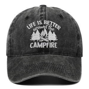 Detail of white campfire embroidery on vintage washed grey cotton baseball cap