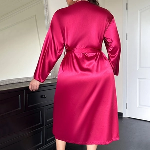 Long rose red satin bathrobe for women with V-neck and belted waist shown from the back