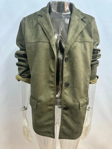 Macro view of olive green faux suede jacket showing pocket detail and fabric texture