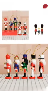 Detail view of five 13cm wooden nutcracker soldiers with hand-painted details and gold ropes