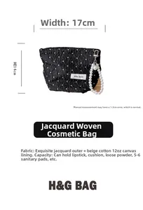Polka dot makeup bag with pearl handle, 17x14cm size guide and jacquard fabric detail