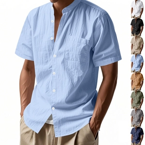 Detail view of men's linen short sleeve shirt featuring stand collar and chest pocket