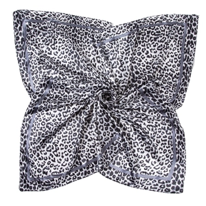 Macro detail of leopard print satin square scarf with silky texture and grey border