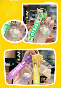 Macro detail of seashell liquid sand keychain with glitter and colorful silicone wristband