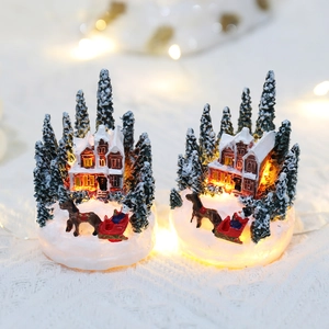 Lighted Christmas resin house decor with snowy pine trees and reindeer sleigh miniature