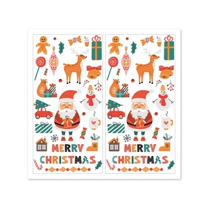 Flat lay of Merry Christmas sticker set featuring Santa, reindeer, and tree illustrations