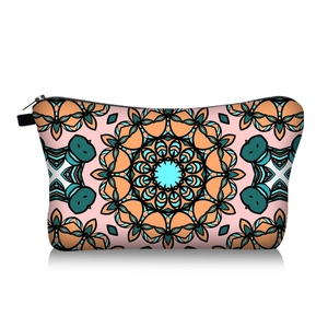 Detailed view of mandala floral print on fabric makeup bag with black zipper closure