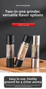 Close-up of dual manual stainless steel pepper grinder with adjustable coarseness setting