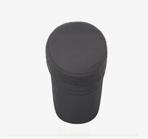Detail view of dark grey flat top cap showing metal side vents and stitched brim textures